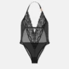 Bestickter Body mit Spitzenbesatz