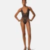 Bestickter Body mit Spitzenbesatz
