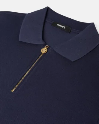 Besticktes Polohemd aus Baumwollpiqué mit halbem Reißverschluss