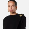 Drapierter Pullover aus Wollstrick