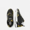 Dynamische Chain Couture Sneakers