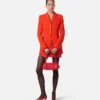 Eng anliegender, einreihiger Blazer aus Wolle mit Nieten