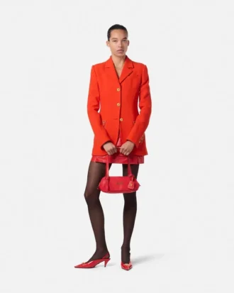 Eng anliegender, einreihiger Blazer aus Wolle mit Nieten