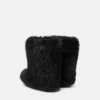 Gianni Ribbon Shearling Boots