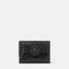 La Medusa verzierte Satin-Clutch