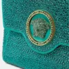 La Medusa verzierte Satin-Clutch