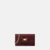 Medusa 95 Clutch mit Krokodilleder-Optik