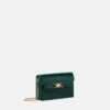 Medusa 95 Clutch mit Krokodilleder-Optik