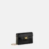 Medusa 95 Clutch mit Krokodilleder-Optik
