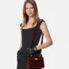 Medusa 95 Kleine Handtasche mit Krokodillederoptik und Tragegriff